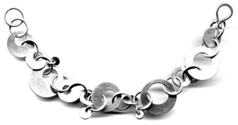OLGA $300-sterling silver bracelet with lightly brushed surface (7 1/4" long) OLGA $300-sterling silver bracelet with lightly brushed surface (7 1/4" long)
